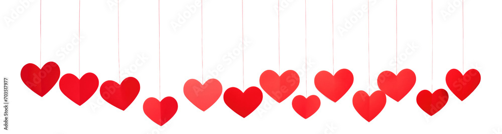 Red paper hearts hanging isolated on a transparent background. Valentine's day decoration.