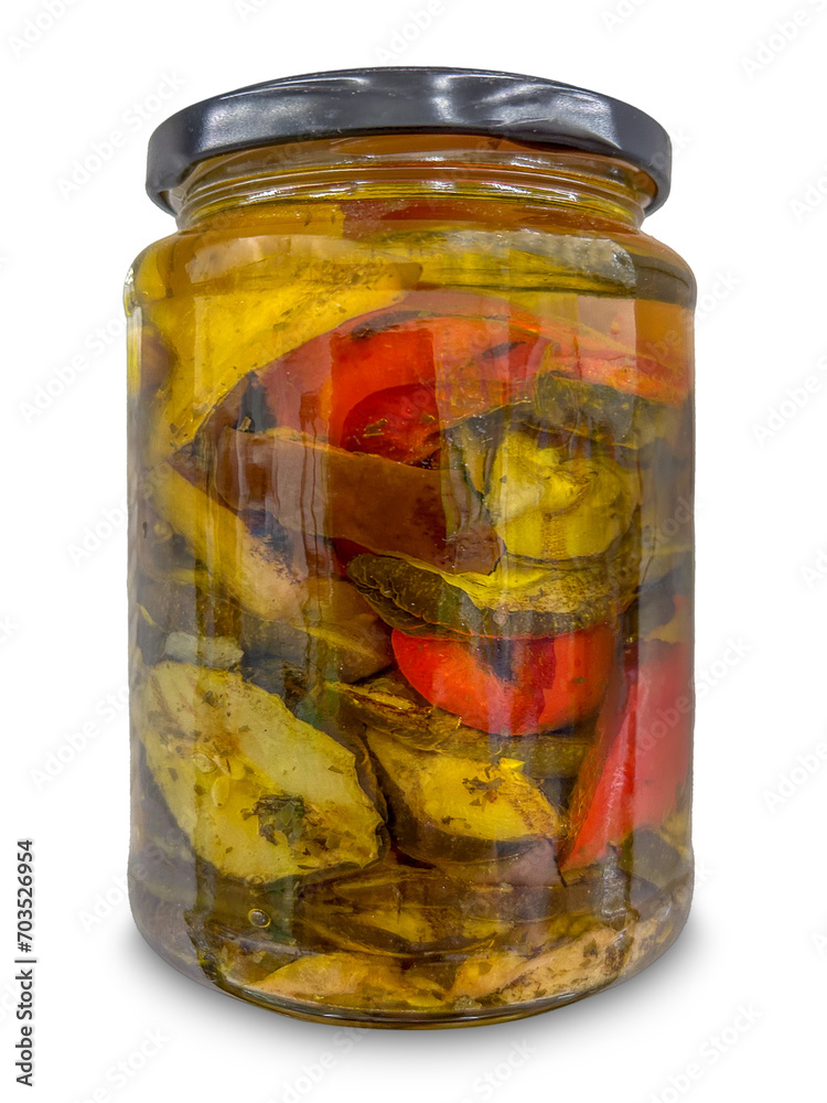 Mixed vegetables grilled and preserved in oil in glass jar isolated Mixed vegetables grilled and preserved in oil in glass jar isolated