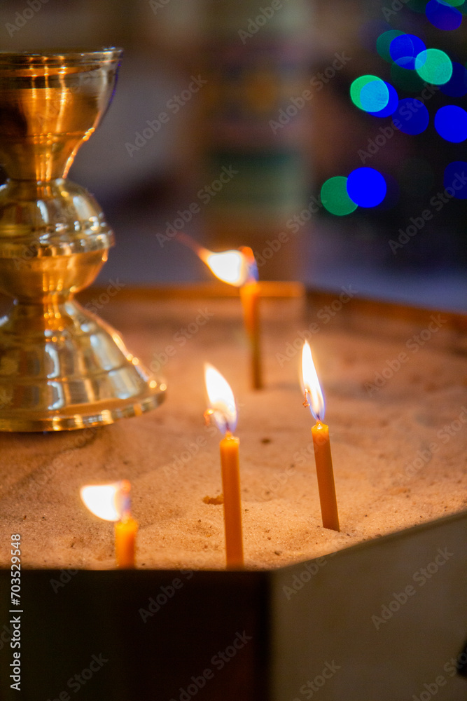 burning candles in church burning candles in church