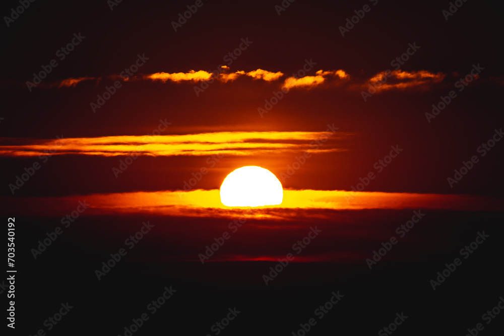 Sunset and beautiful light, sunlight illuminating the colorful sky, clouds Sunset and beautiful light, sunlight illuminating the colorful sky, clouds