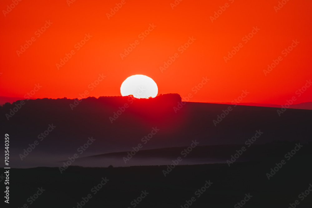 Sunset and beautiful light, sunlight illuminating the colorful sky, clouds Sunset and beautiful light, sunlight illuminating the colorful sky, clouds