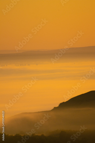 Sunrise landscape, colorful warm cold nature, world, river, hills and village © Stefana