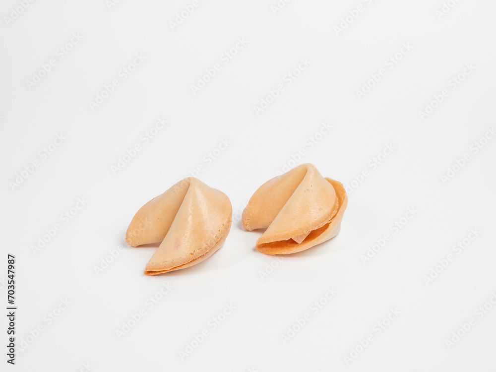 Fortune cookies on a white background. Fortune cookies close up. Fortune cookies on a white background. Fortune cookies close up.