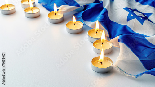 Burning candles on the background of the Israeli flag. photo