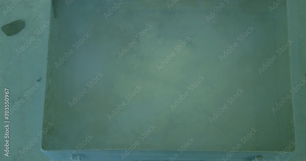 Cool Science Pouring water into a metal box filled with a liquid