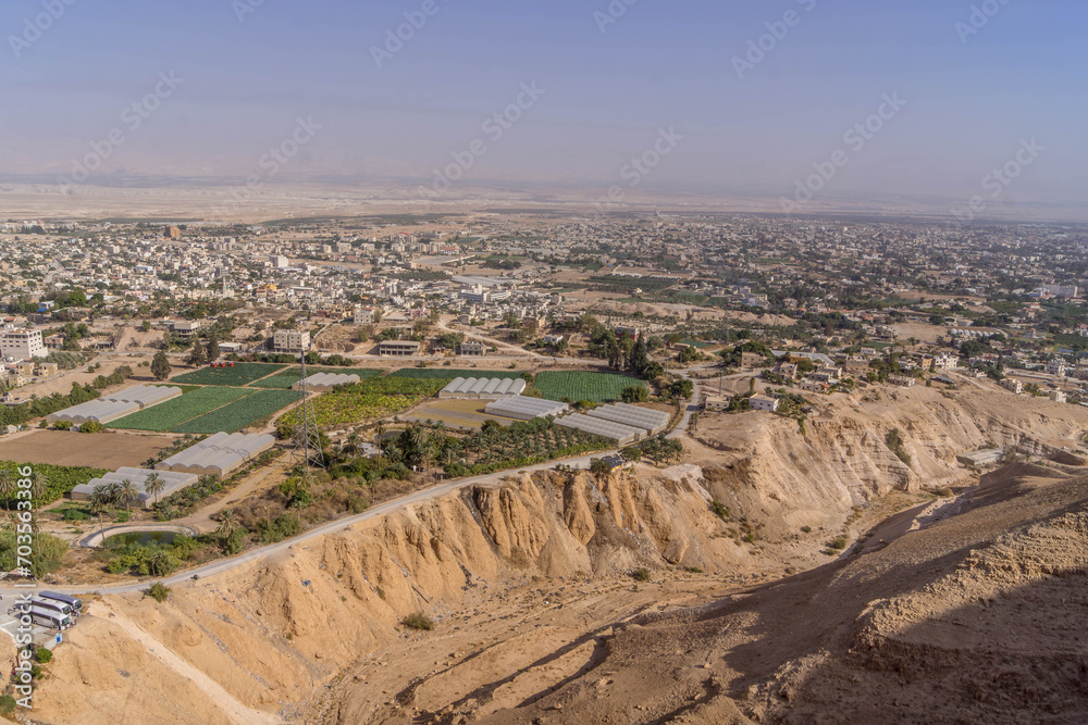The aerial view on downtown of the Palestinian city of Jericho, West Bank, Palestine, during the hot summer day.