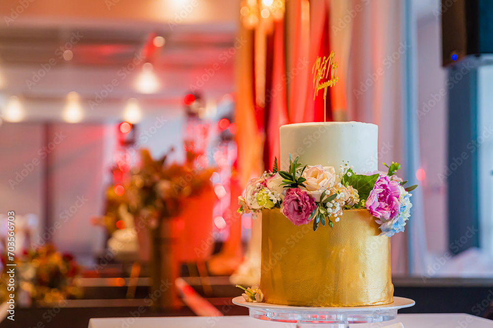 Beautiful white wedding cake decorated with roses