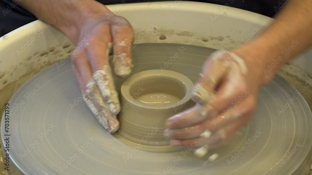 Ceramic pot on a potter's wheel. Making a ceramic pot Ceramic pot on a potter's wheel. Making a ceramic pot