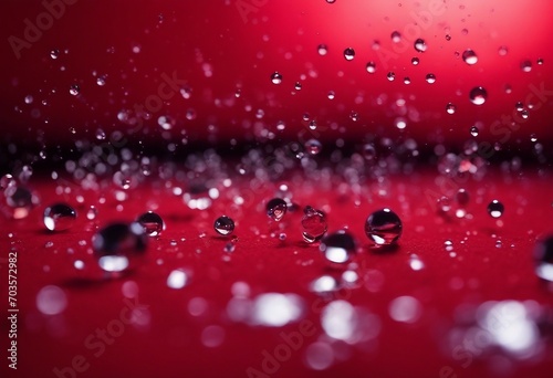 A lot of water drops on a red background