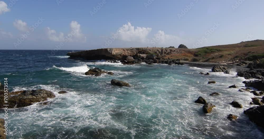 Epic glide cam toward ledge over foaming ocean waves Epic glide cam toward ledge over foaming ocean waves