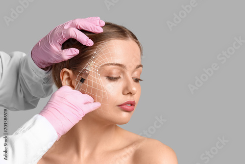 Young woman receiving fille...