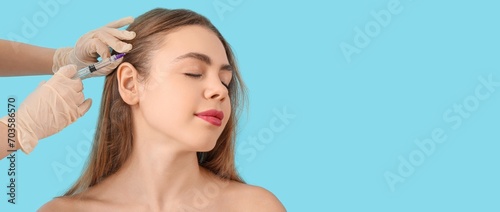 Young woman receiving fille...