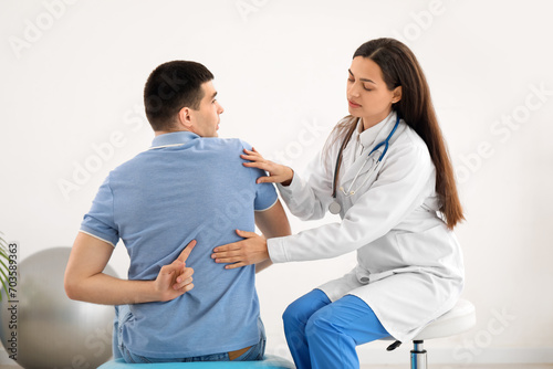 Female doctor checking post...