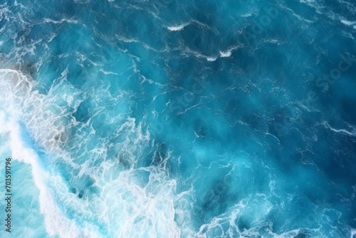 A blue ocean with white foamy waves © Viktoriia