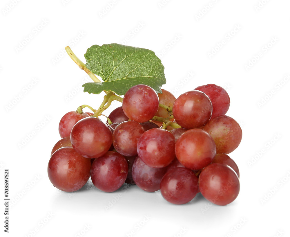 Fototapeta premium Tasty ripe grapes with leaf on white background