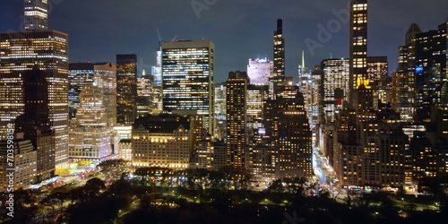 Night New York City, Manhattan famous top view. Manhattan from above. NYC panorama. NYC skyline at twilight. New York famous building. Night traffic in NYC. Lower Manhattan. Night NYC from drone. © Volodymyr