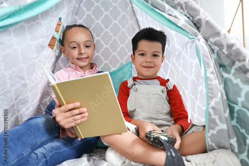 Cute little children readin...