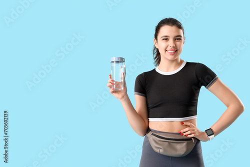 Young woman in sportswear w...