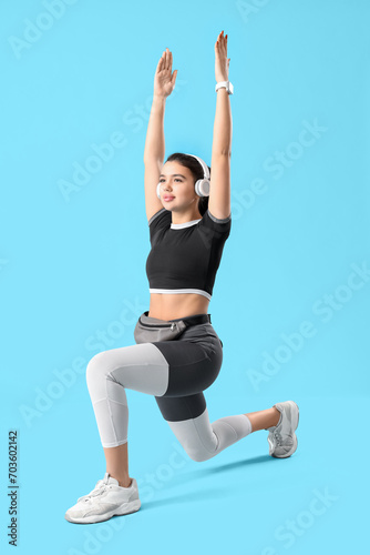 Young woman in sportswear t...