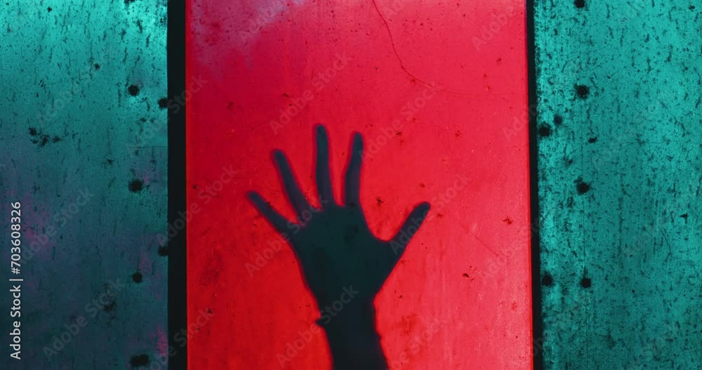 shadow people hand or human palm try to hits and breaks smashing on