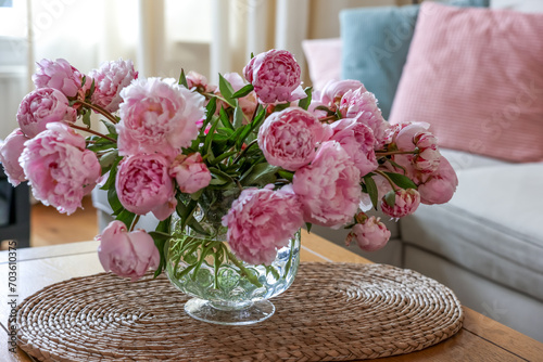 Fototapeta Naklejka Na Ścianę i Meble -  Beautiful pink peonies in vase on table at home. Interior design