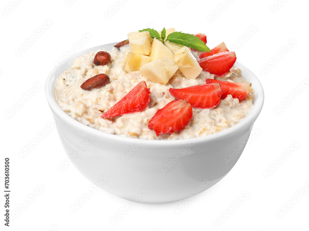 Tasty boiled oatmeal with strawberries, banana and almonds in bowl isolated on white Tasty boiled oatmeal with strawberries, banana and almonds in bowl isolated on white