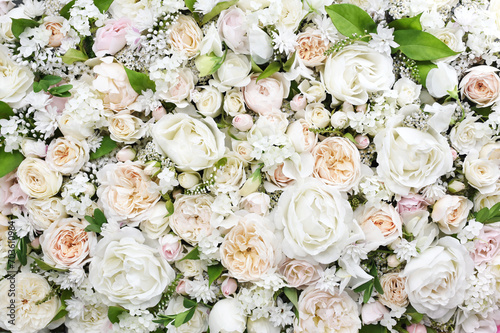 Delicate blooming festive roses and pink summer flowers, blossoming rose flower soft pastel background, bridal bouquet floral card, selective focus
