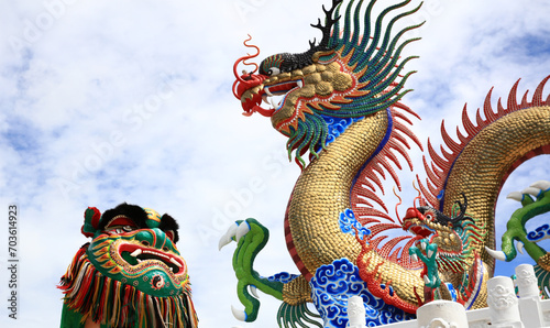 Dragon and lion dance against with Dragon Status, Chinese Culture