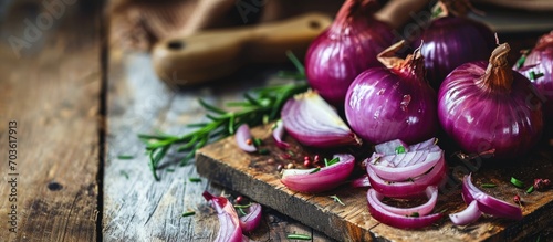 An onion on a cutting board with space for text. photo