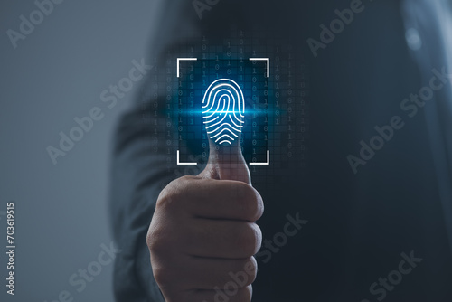 Security of future finger print technology and Cybernetics on the Internet concept, fingerprint scanning allows access to security and identification of big Data businesses, bank and Cloud Computers. photo