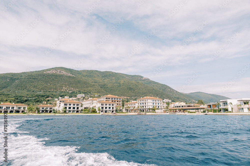 View from the sea to the beach near the villas of the One and Only hotel complex. Portonovi, Montenegro