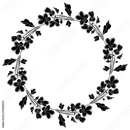 Round floral frame or botanical border with blooming branches of wild pansy or viola tricolor flower. Vintage style. Black and white silhouette.