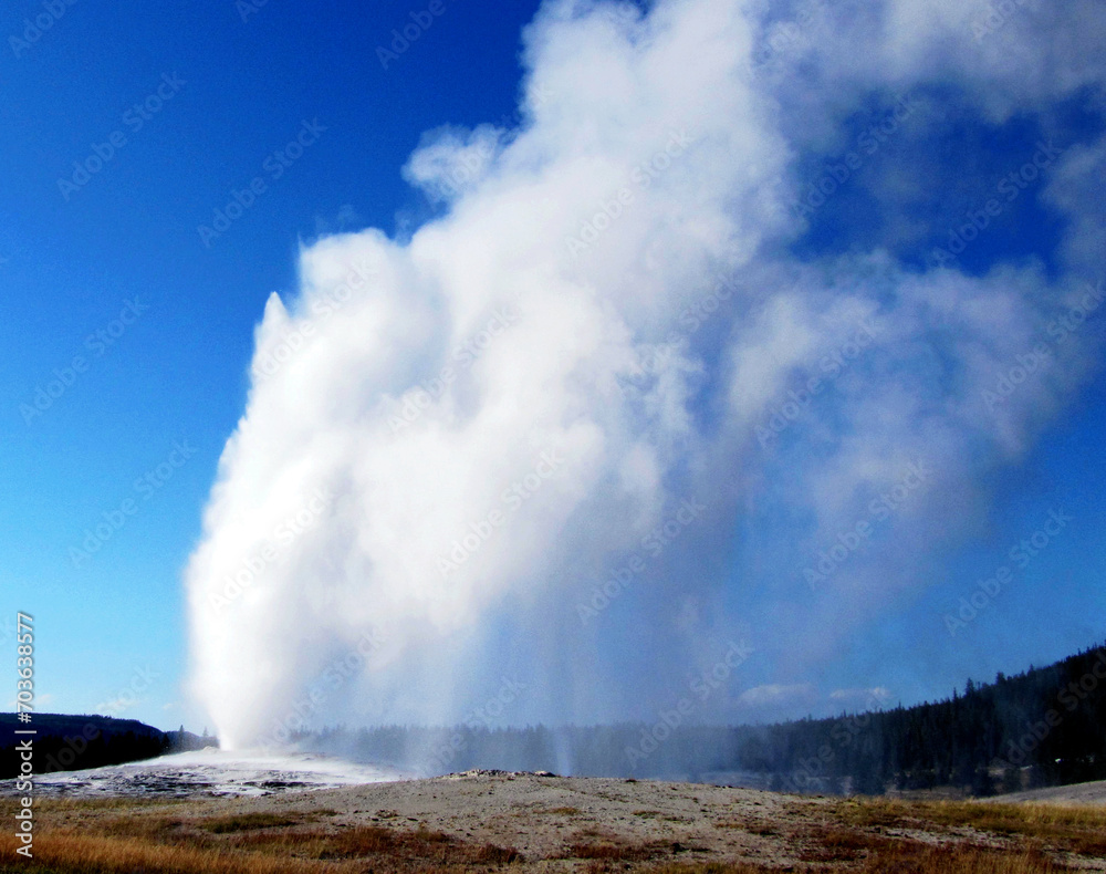 Spectacular panoramic views at Old Faithful Geyser in Yellowstone National Park, Wyoming Montana. Great hiking. Summer wonderland to watch wildlife and natural landscape. Geothermal.