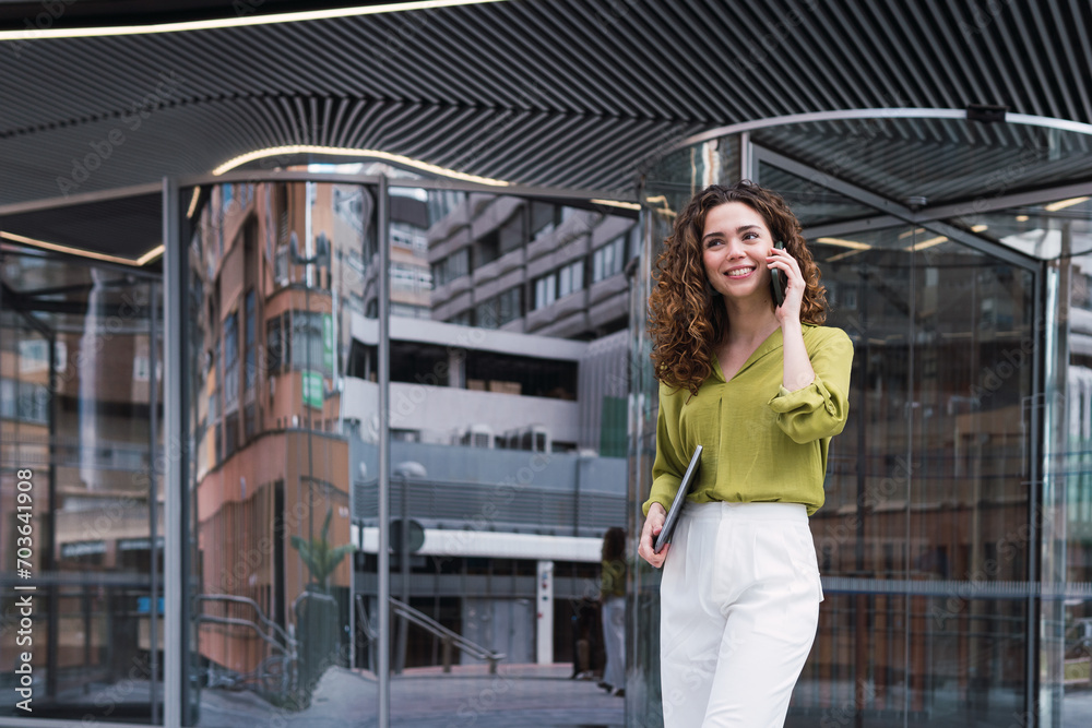 Happy businesswoman talking on phone Happy businesswoman talking on phone