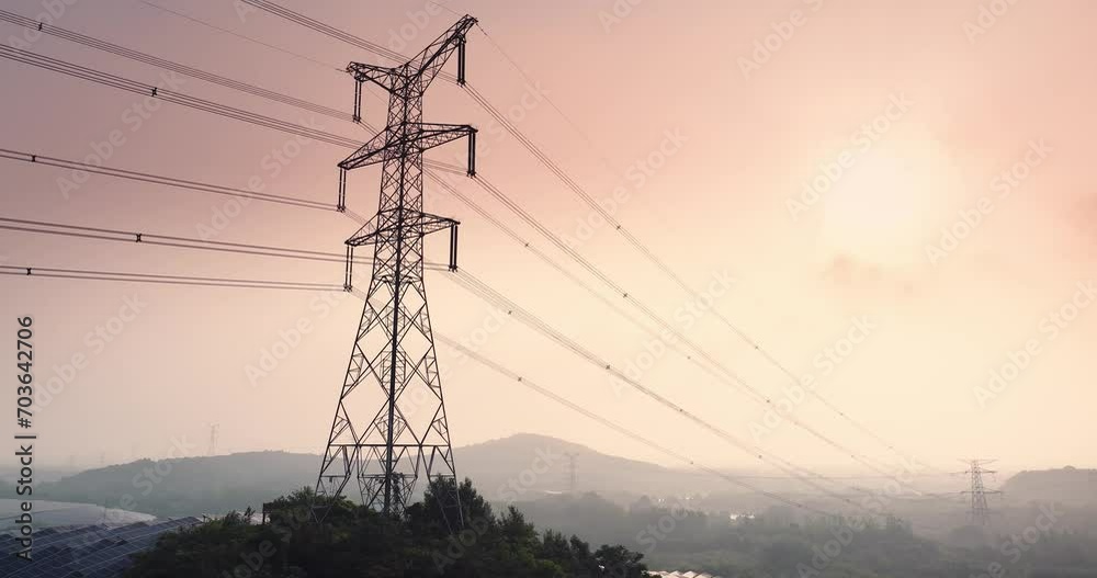 high voltage tower on hill