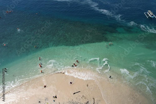 Aerial view of Gili Nanggu beach in Lombok Island, West Nusa Tenggara, Indonesia. Turquoise crystal clear water beach in tropical island.  photo