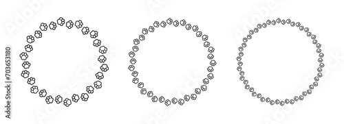 Round frame made of animal paw prints outline silhouette set. Cute dog paw print track trail border collection. Vector illustration