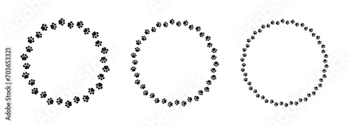 Round frame made of animal paw prints silhouette set. Cute dog paw print track trail border collection. Vector illustration