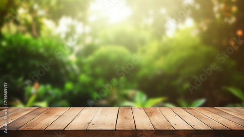 empty wood table with blur montage outdoor garden background