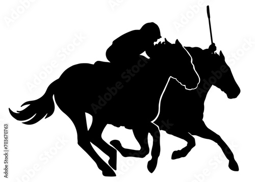 silhouette of racehorses