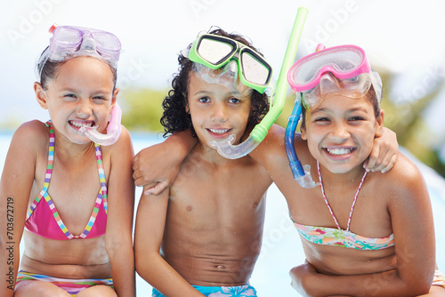 Pool, happy and portrait of children with goggles for swimming lesson, activity or hobby fun. Smile, snorkeling and kids with equipment for skill or tricks in water of outdoor backyard at home.