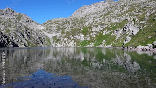 Lambin Lake, a glacial fjord in the mountains of the Adamello Brenta Natural Park photo