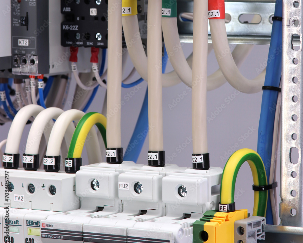 Electronic control modules for apartment automation are installed in an ...