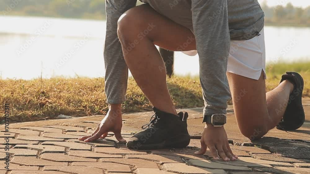Athlete runner feet running on road, Jogging concept at outdoors. Man running for exercise. Athlete runner feet running on road, Jogging concept at outdoors. Man running for exercise.