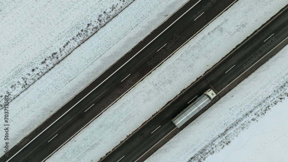 Drone photography of rural highway top down view during winter day