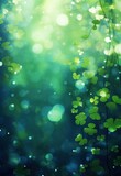 Saint Patrick day abstract background. Green clover leaves on beautiful bokeh background. Holiday concept.