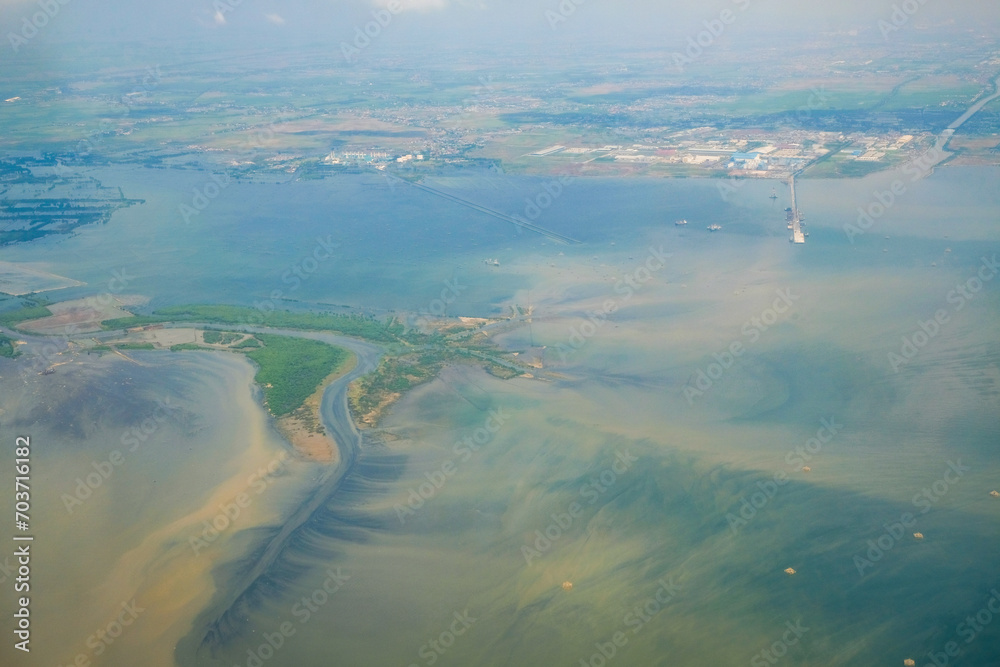 Aerial view of one of the biggest River in Borneo Island. Shoot from Airplane. Aerial Photography, Geographic, Indonesia.
