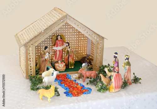 Simple crib displaying the nativity scene including the three kings photo