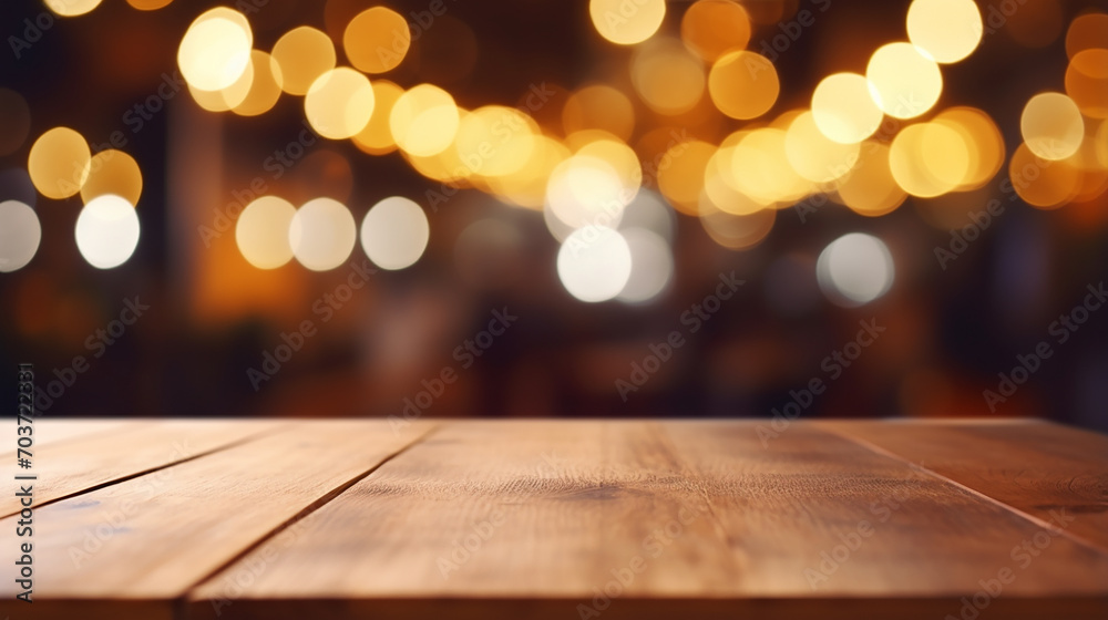 Christmas background design with empty wooden table top on blur light golden bokeh background