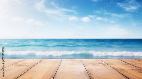 Wood table top on blur sparkling sea water and summer with bright blue sky